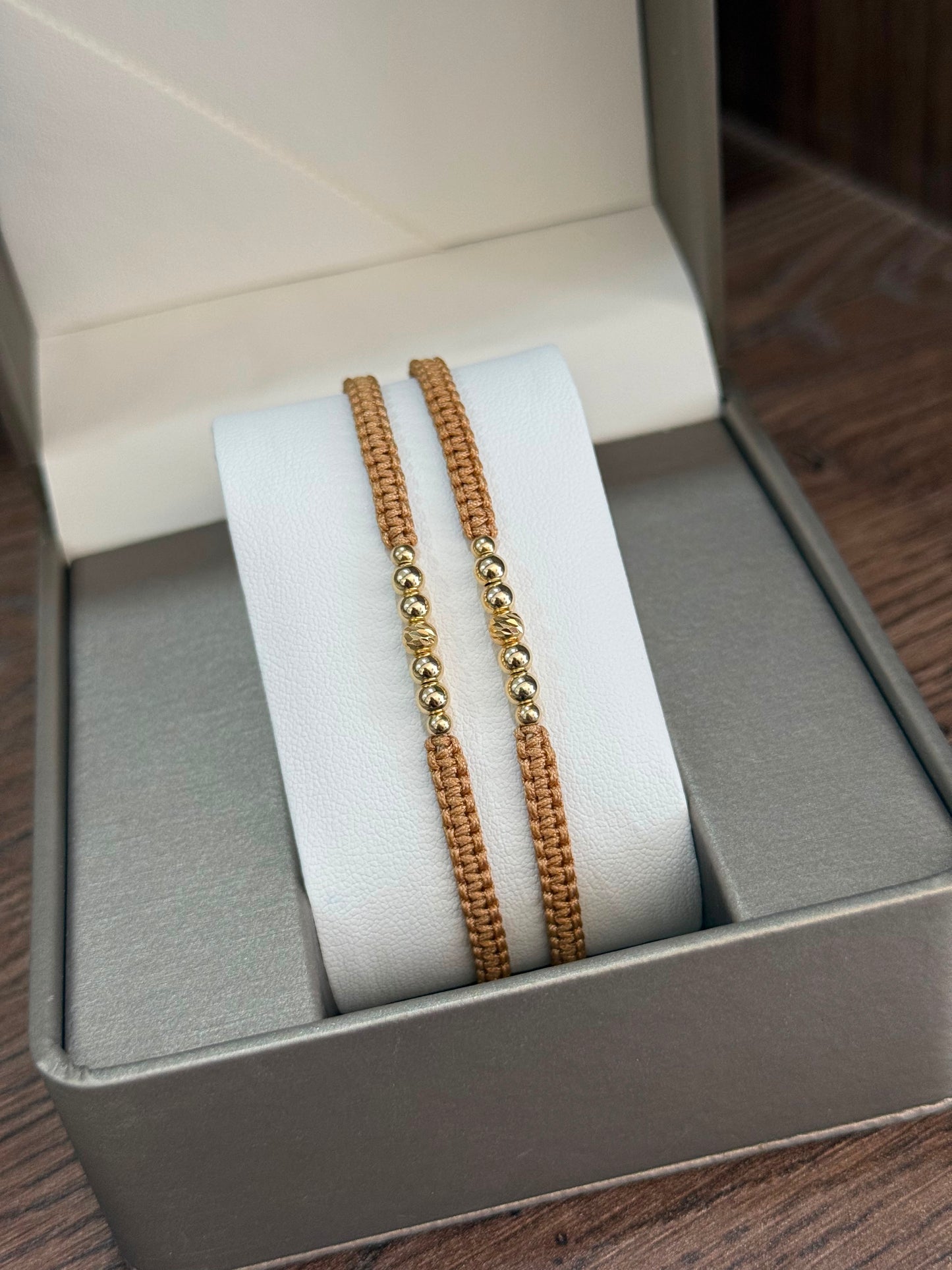Duo pulseras tejidas beige