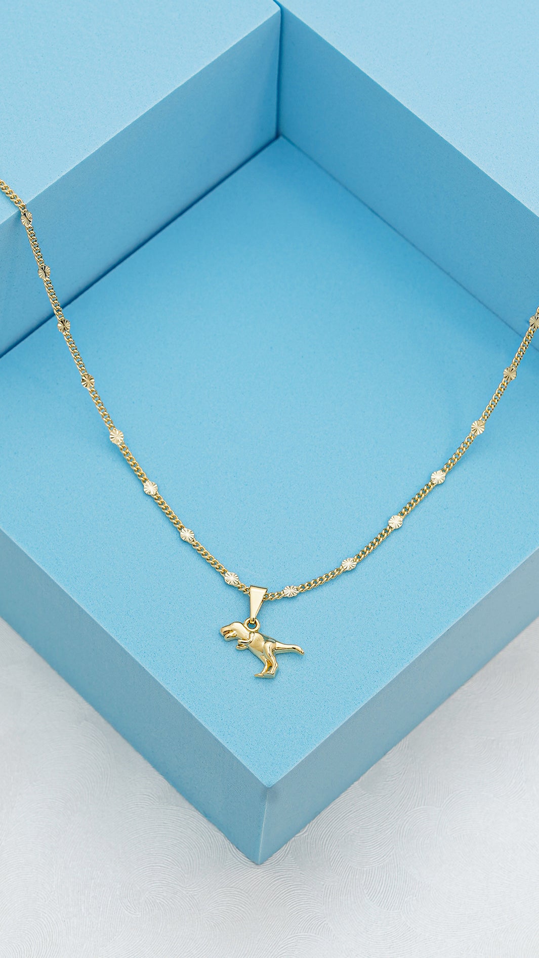 Cadena cubana con destellos punteras (45cm) + Dije T-Rex